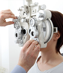woman having eyes examined